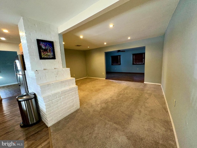 unfurnished living room with carpet flooring