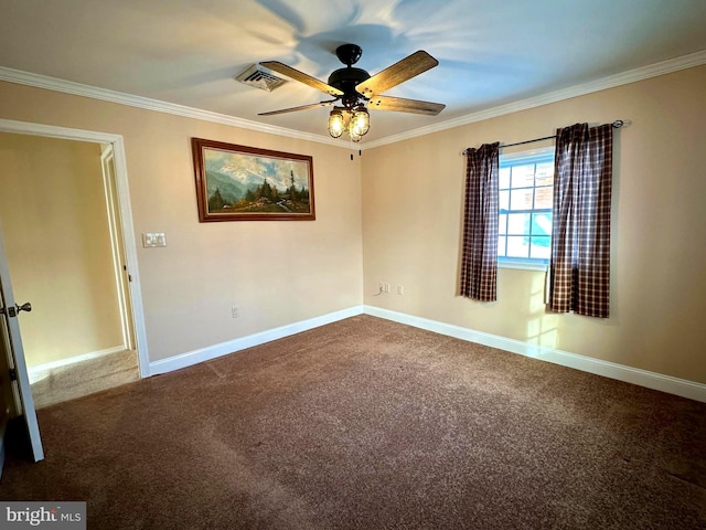 carpeted spare room featuring ceiling fan and ornamental molding