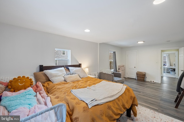 bedroom featuring dark hardwood / wood-style floors