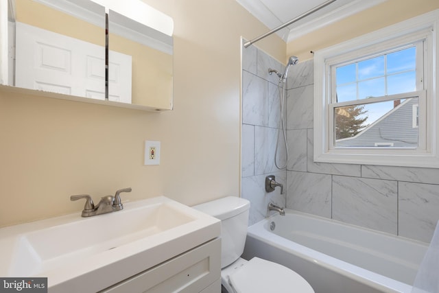 full bathroom with tiled shower / bath combo, vanity, crown molding, and toilet