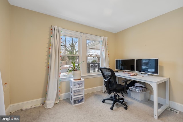 view of carpeted office space