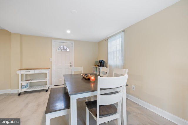 dining space featuring light hardwood / wood-style flooring