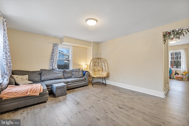 living room featuring light wood-type flooring