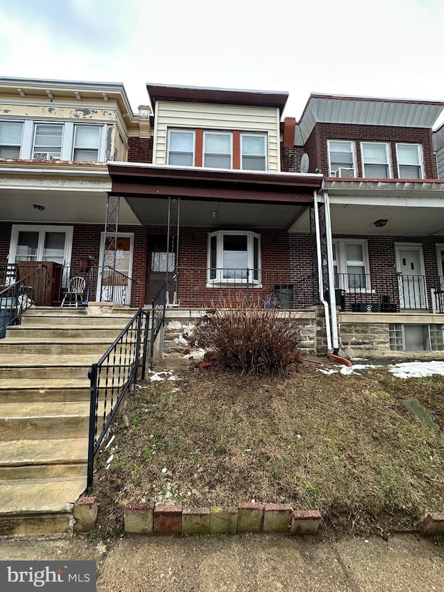 view of property featuring a porch