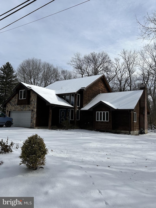 view of front of home with a garage