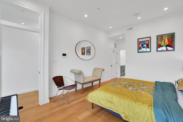 bedroom featuring light hardwood / wood-style floors