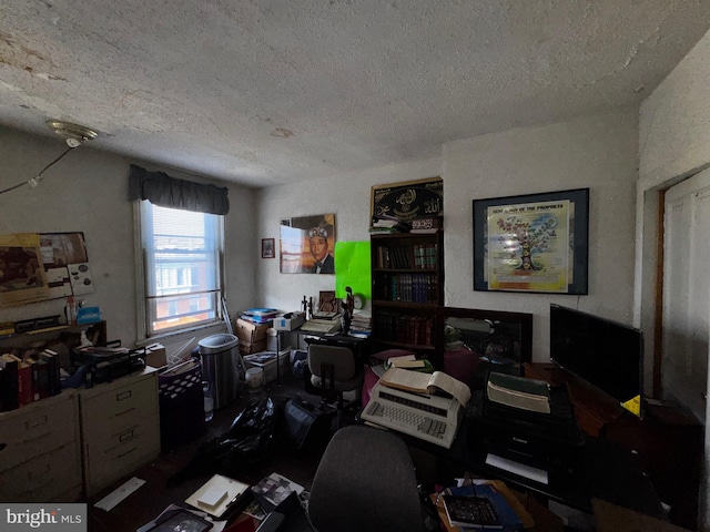 office area featuring a textured ceiling