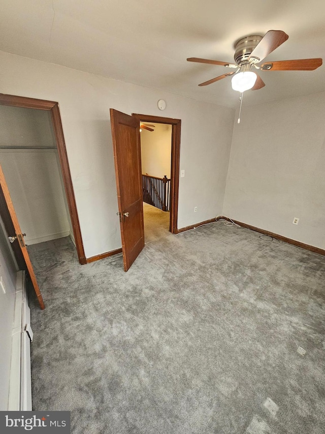 unfurnished bedroom featuring light carpet and ceiling fan