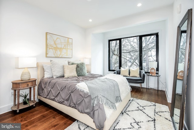 bedroom featuring dark wood-type flooring