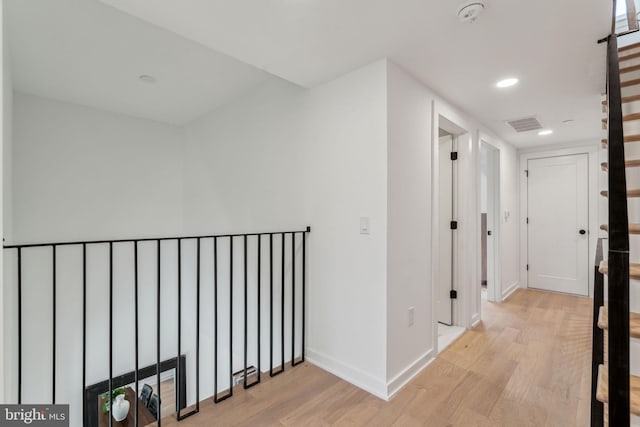 hallway featuring light hardwood / wood-style floors