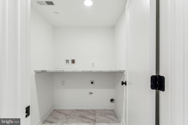 laundry room with hookup for a gas dryer, electric dryer hookup, and hookup for a washing machine