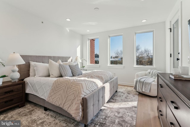 bedroom with light wood-type flooring