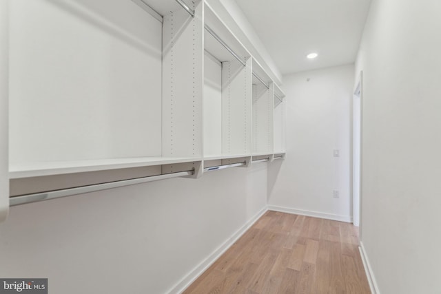 walk in closet featuring light wood-type flooring