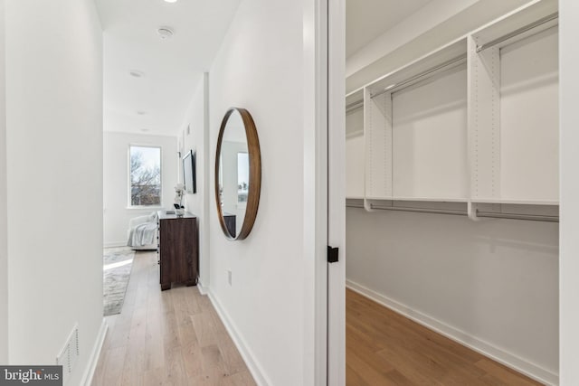 hall featuring light wood-type flooring