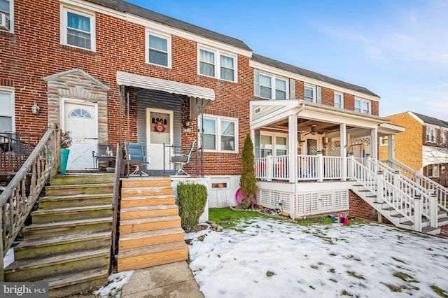 multi unit property featuring a porch