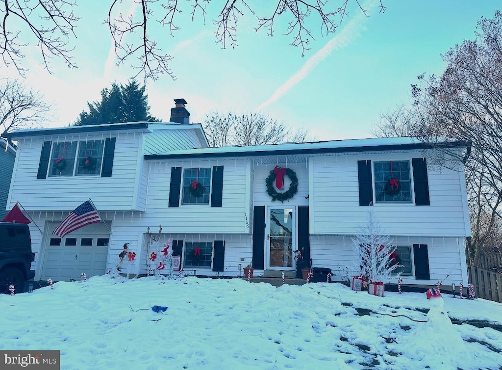 raised ranch with a garage