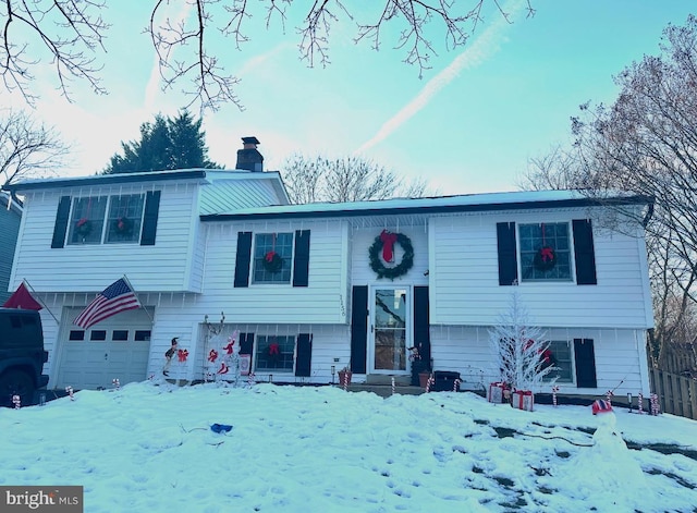 raised ranch with a garage