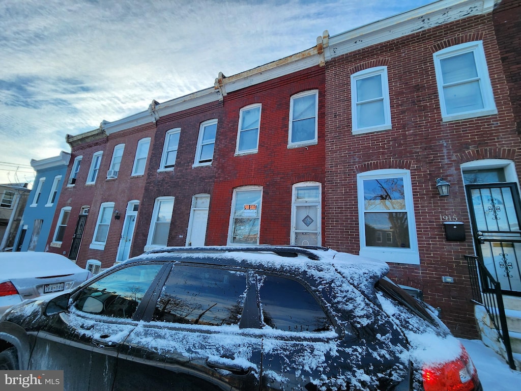 view of snow covered property