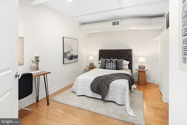 bedroom featuring hardwood / wood-style floors