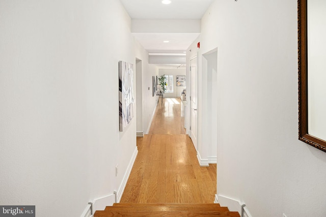 hallway featuring light hardwood / wood-style flooring