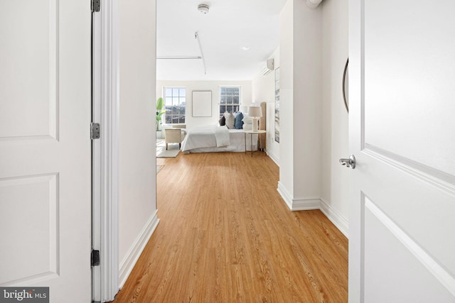 corridor featuring light hardwood / wood-style flooring