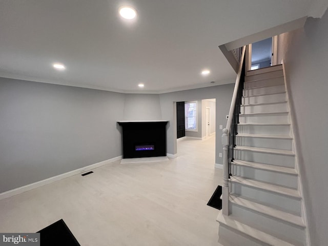 basement with ornamental molding