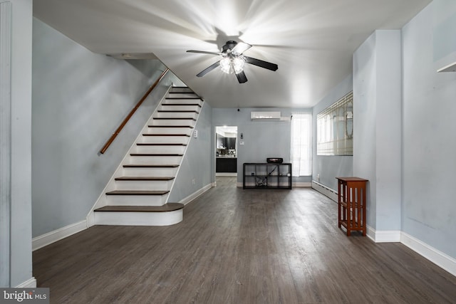 interior space featuring ceiling fan, dark wood-type flooring, a wall mounted AC, and a baseboard heating unit