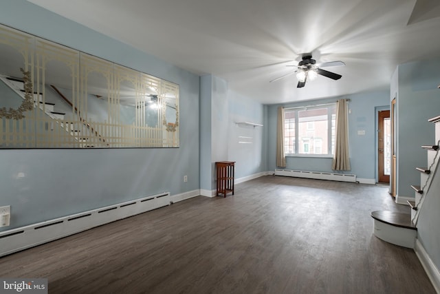 unfurnished living room featuring ceiling fan, baseboard heating, and dark hardwood / wood-style flooring