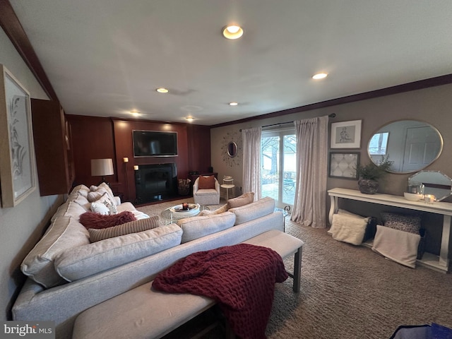 carpeted living room featuring crown molding