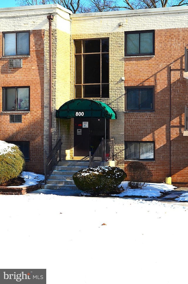 view of snow covered building