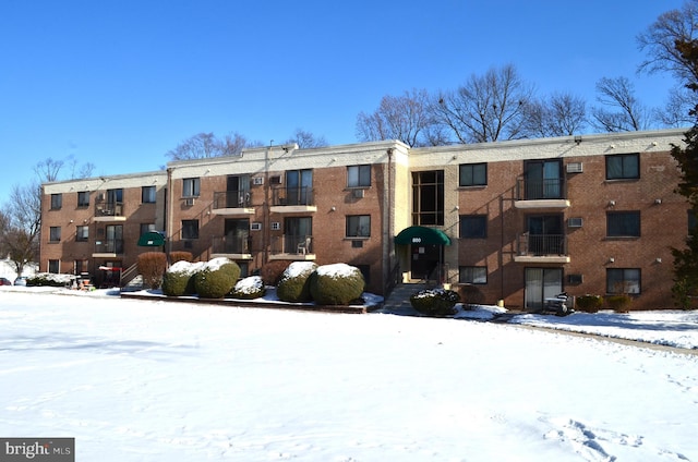 view of snow covered property