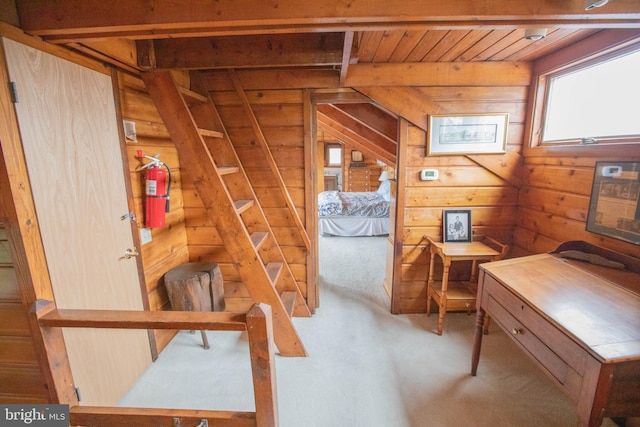 bedroom with wood walls