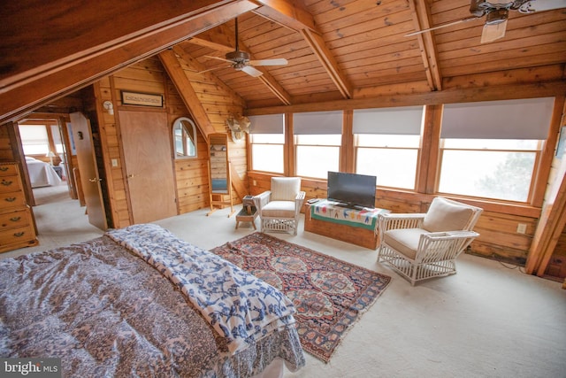 carpeted living room featuring wood ceiling, ceiling fan, lofted ceiling with beams, and wood walls