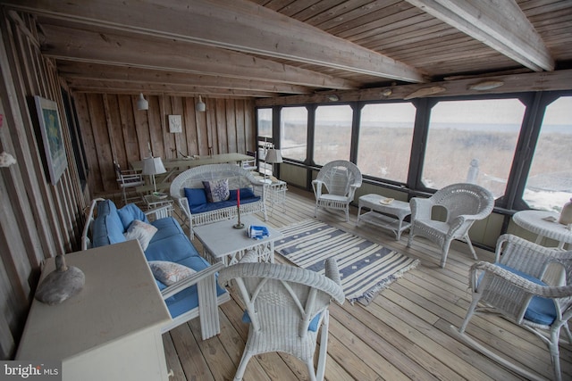 sunroom with beamed ceiling