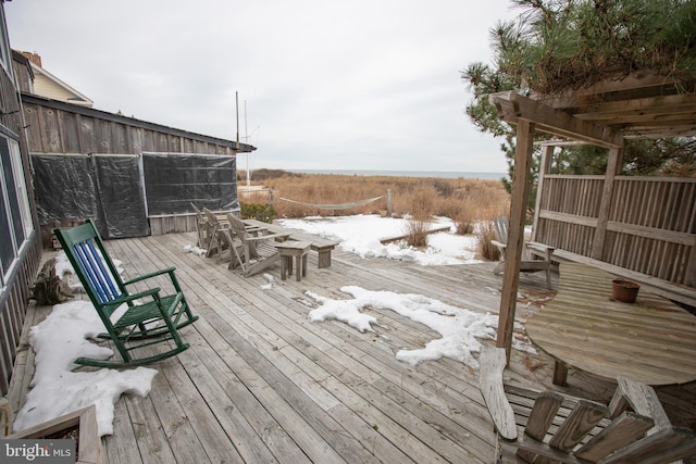 view of snow covered deck