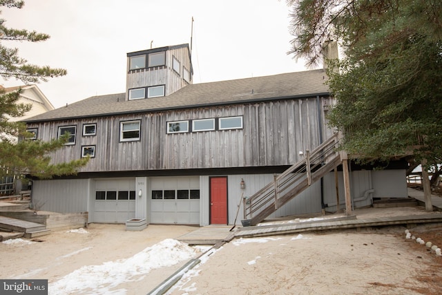 townhome / multi-family property featuring a garage