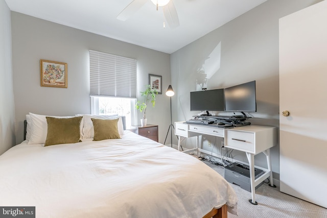 bedroom featuring a ceiling fan, carpet, and baseboards