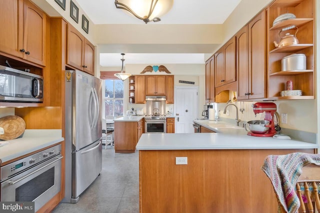 kitchen with under cabinet range hood, a peninsula, stainless steel appliances, a sink, and open shelves