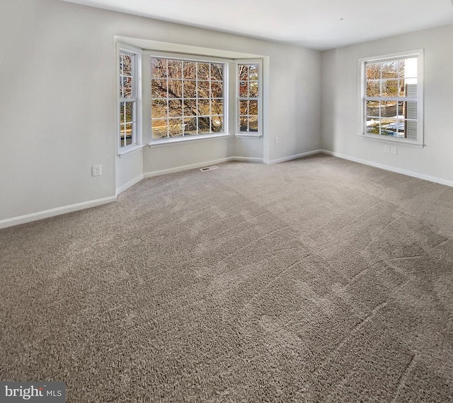 view of carpeted spare room