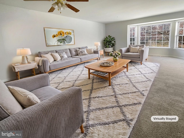 carpeted living room featuring ceiling fan