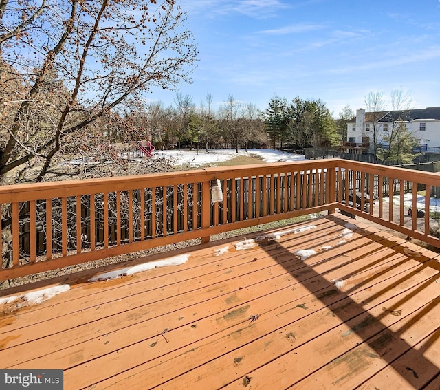 view of snow covered deck