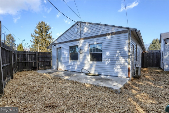 rear view of house with a patio