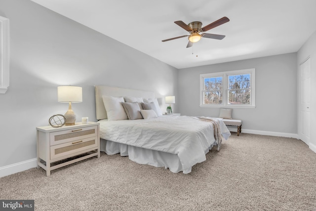 bedroom with ceiling fan and carpet