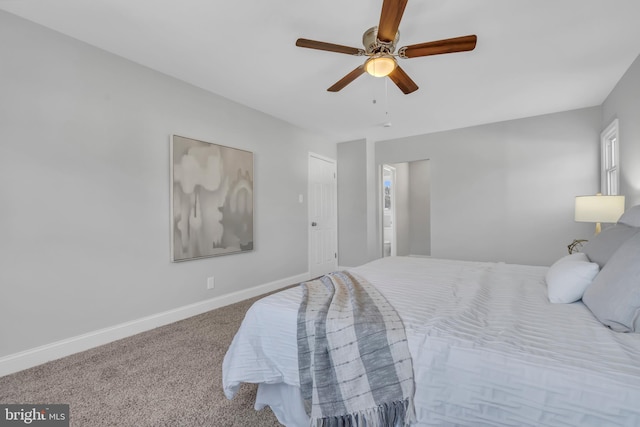 bedroom featuring ceiling fan and carpet flooring