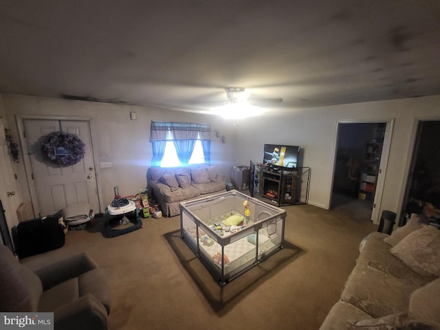 living room with light colored carpet and ceiling fan