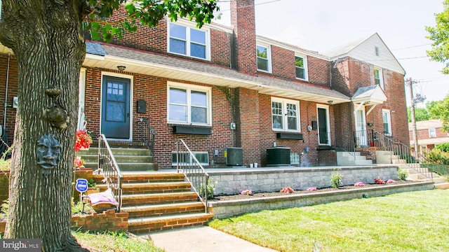 view of front facade with central AC unit