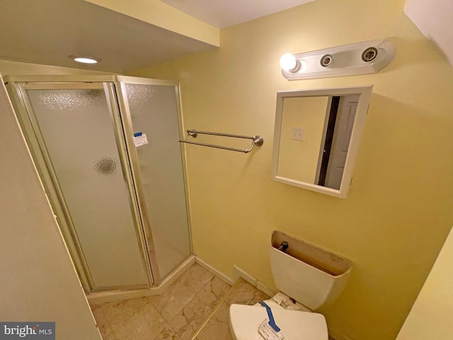 bathroom featuring an enclosed shower