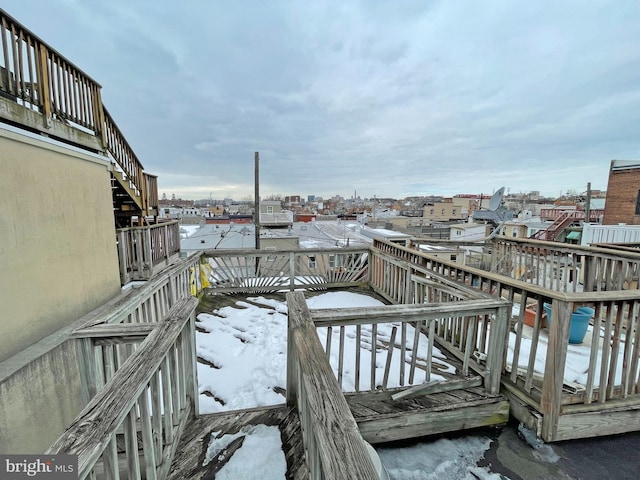 view of snow covered deck