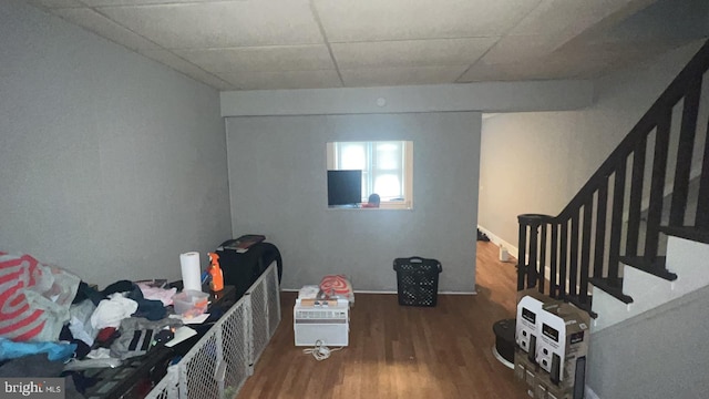 bedroom with dark wood-type flooring