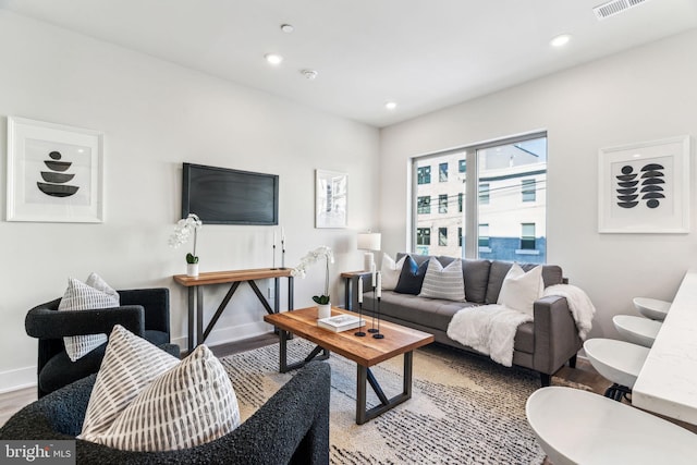 living room with hardwood / wood-style floors